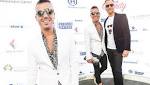 Stylish couple! Anthony Callea and husband Tim Campbell look every inch the glamourous pair at a charity poker …