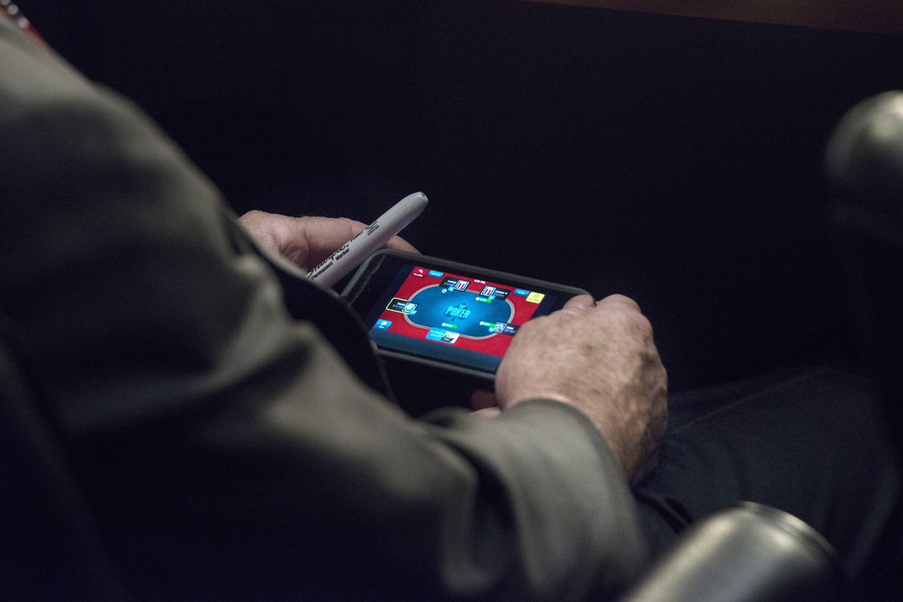 John McCain Playing Poker During the Senate's Syria Hearing | The Atlantic